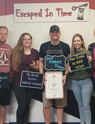 a group of people playing sweet dreams escape room at Escaped In Time