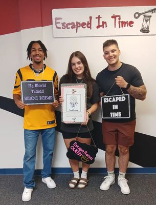 a group of people playing sweet dreams escape room at Escaped In Time